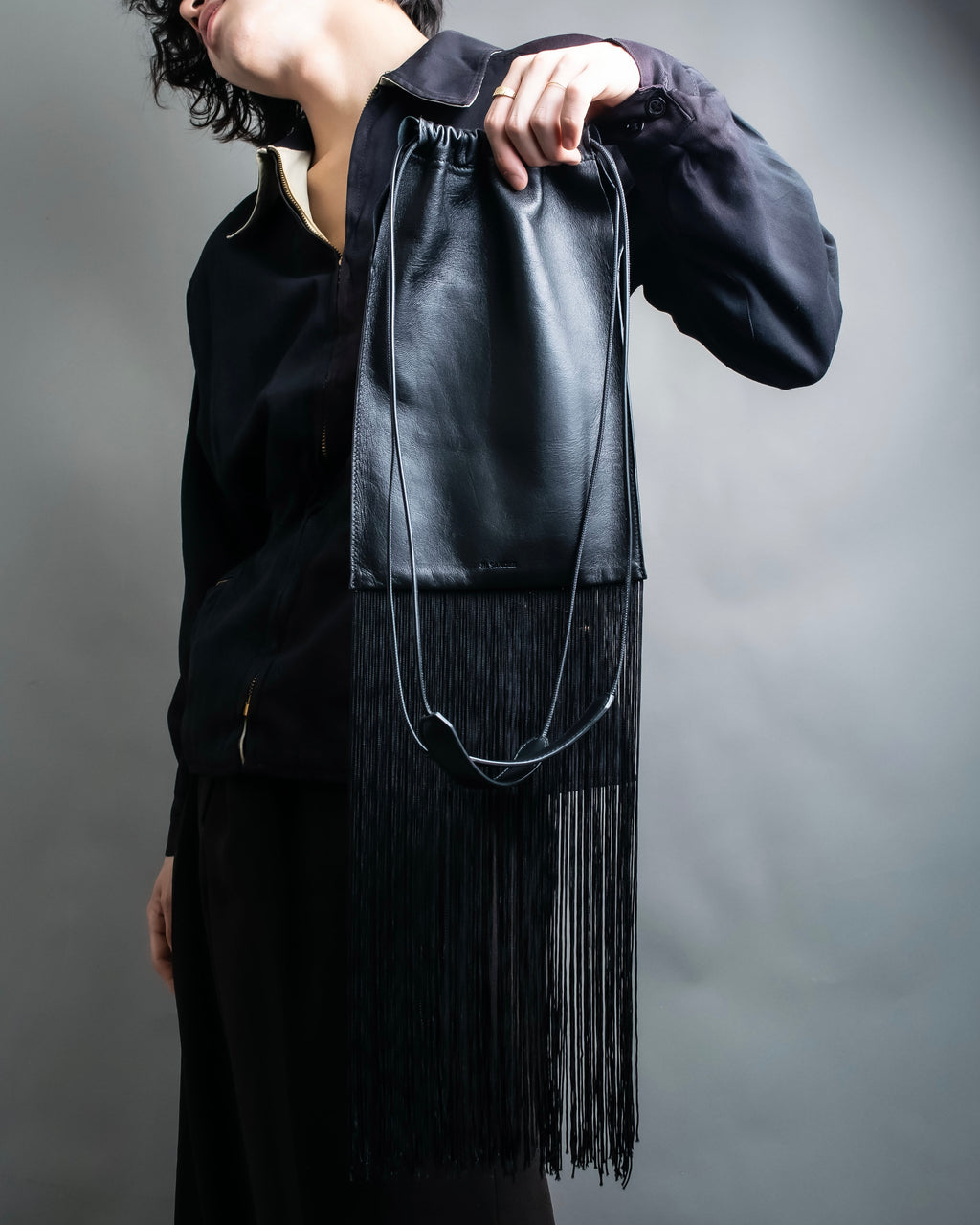 “JIL SANDER” Fringe detail flat drawstring shoulder bag