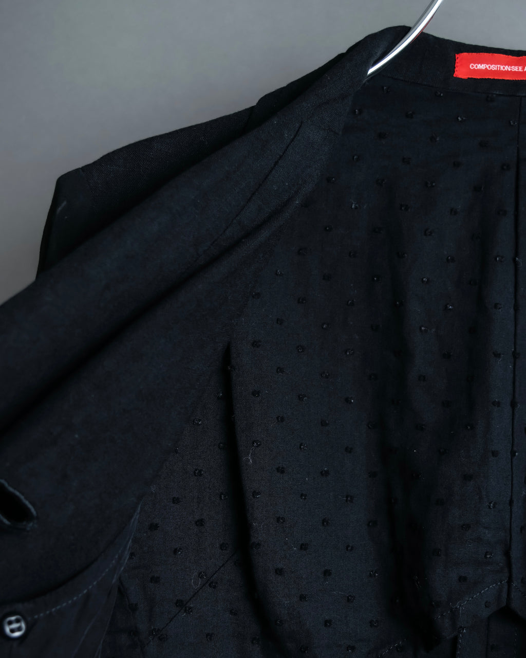 “Y’s COMPOSITION: SEE ATTACHED LABEL” Layered design multi buttons tail coat