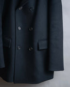 "JOHN LAWRENCE SULLIVAN"
 Large lapel double-breasted mid length coat