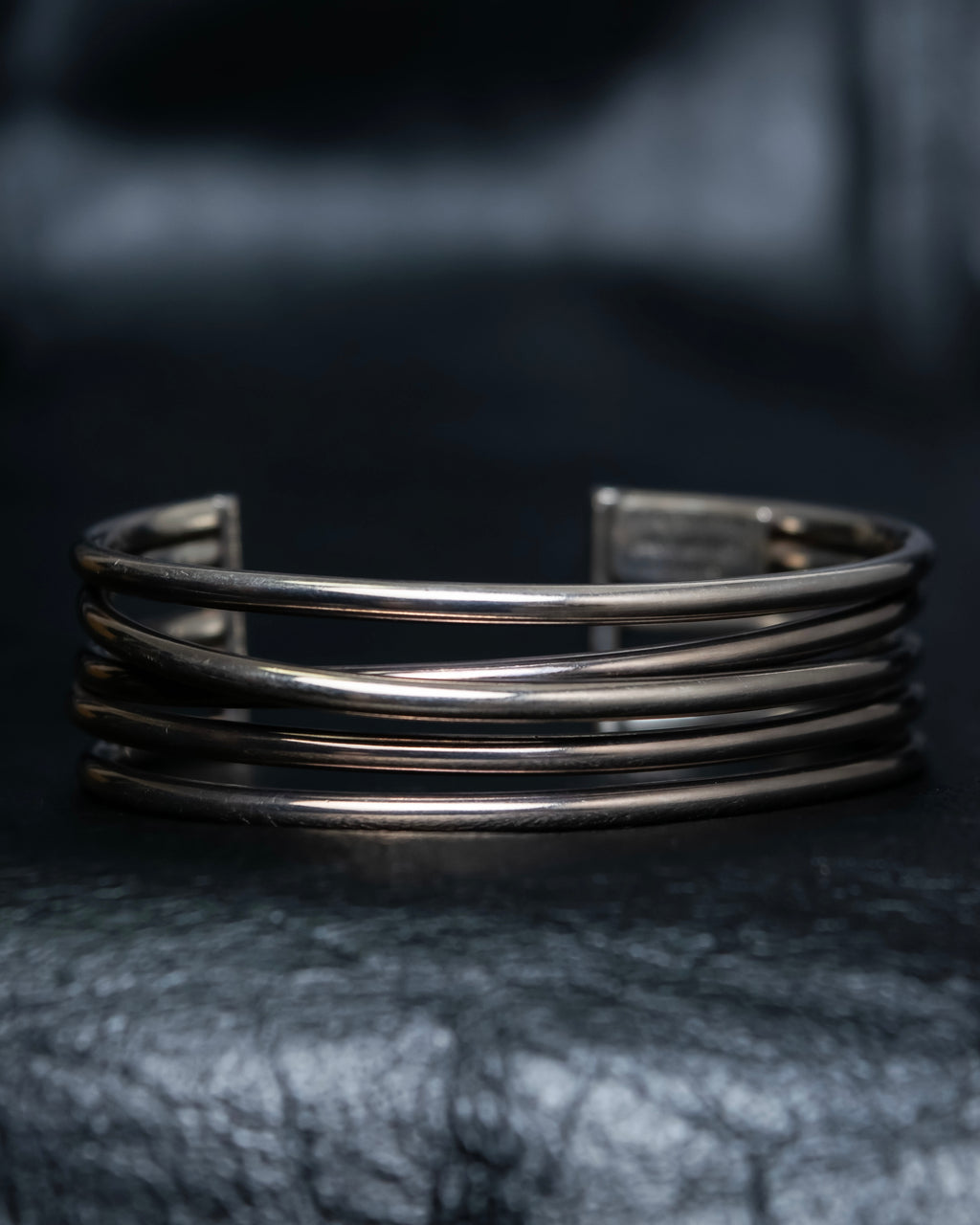 “PHILIPPE AUDIBERT” Crossed 5 line silver bangle