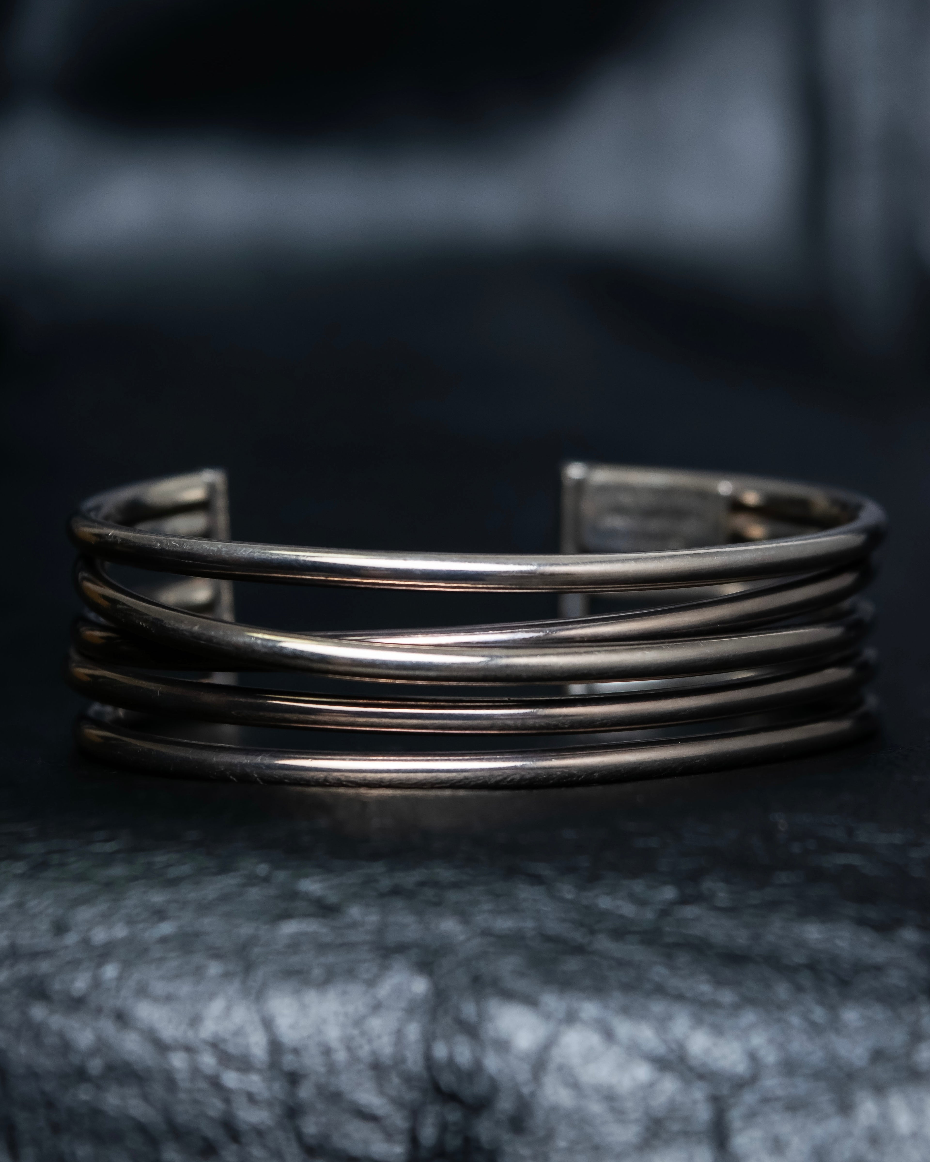 “PHILIPPE AUDIBERT” Crossed 5 line silver bangle