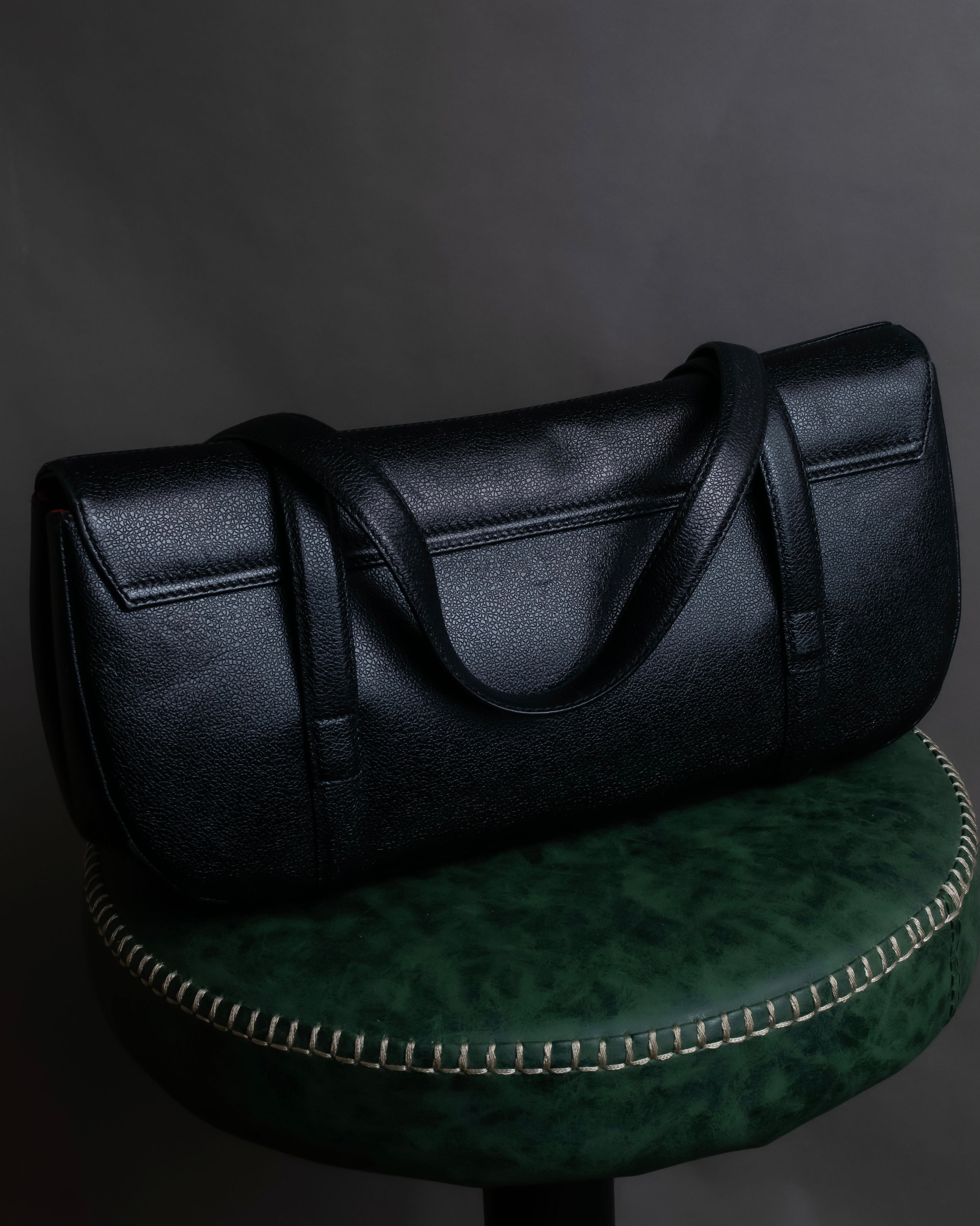 "BVLGARI" Horizontal form engraved logo leather bag