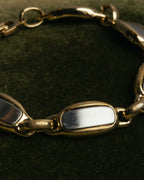 "Christian Dior" 70's-80's Two-tone gold and charcoal link bracelet