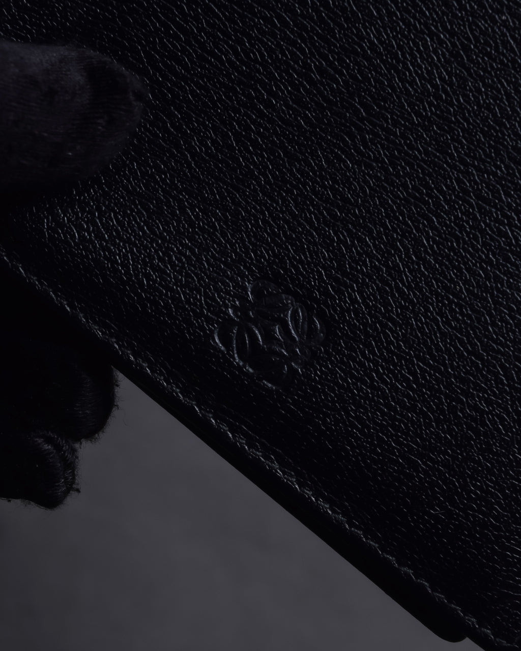 "LOEWE" Logo engraved bi-fold leather wallet