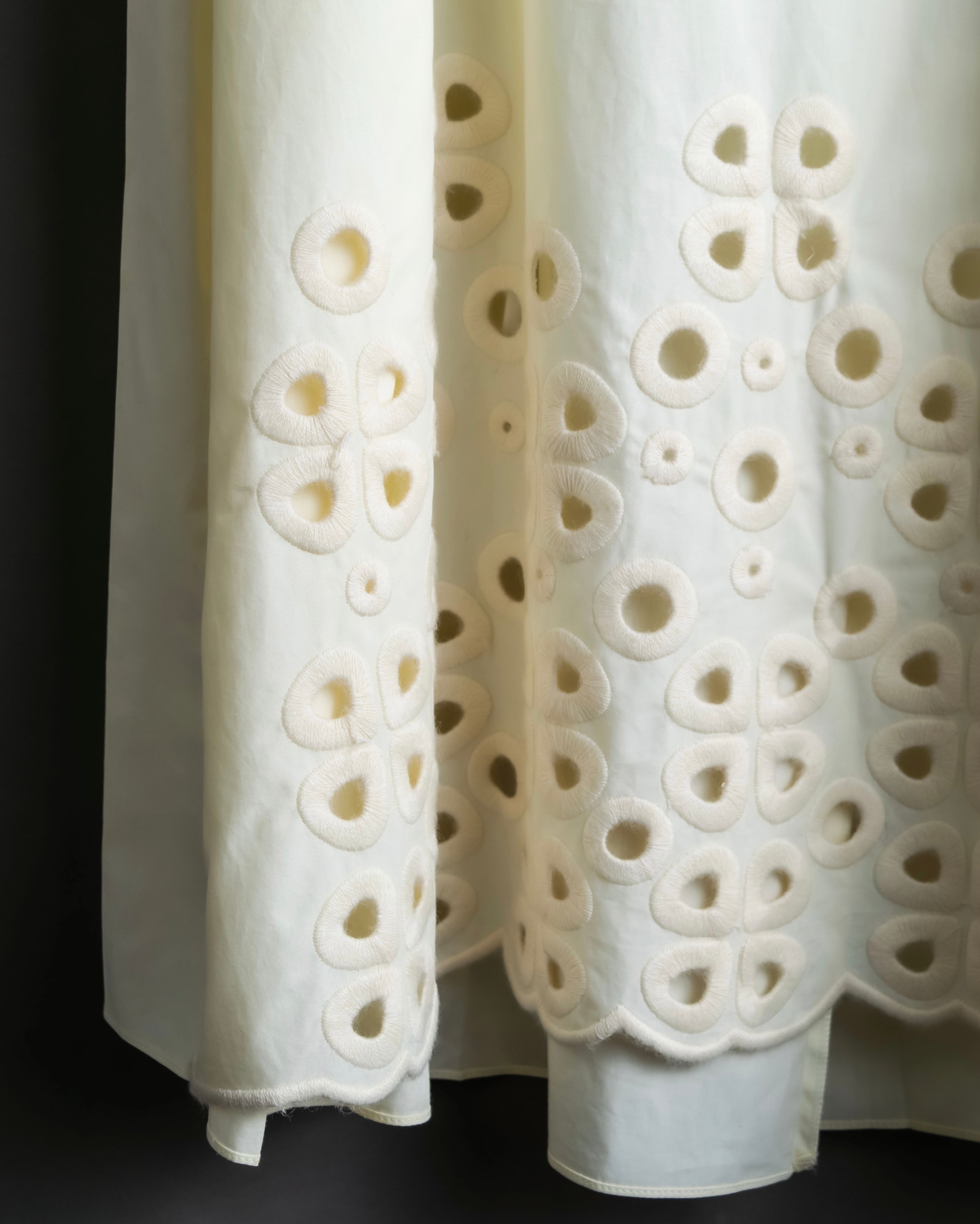 "FENDI" hole pattern and tack designed skirt