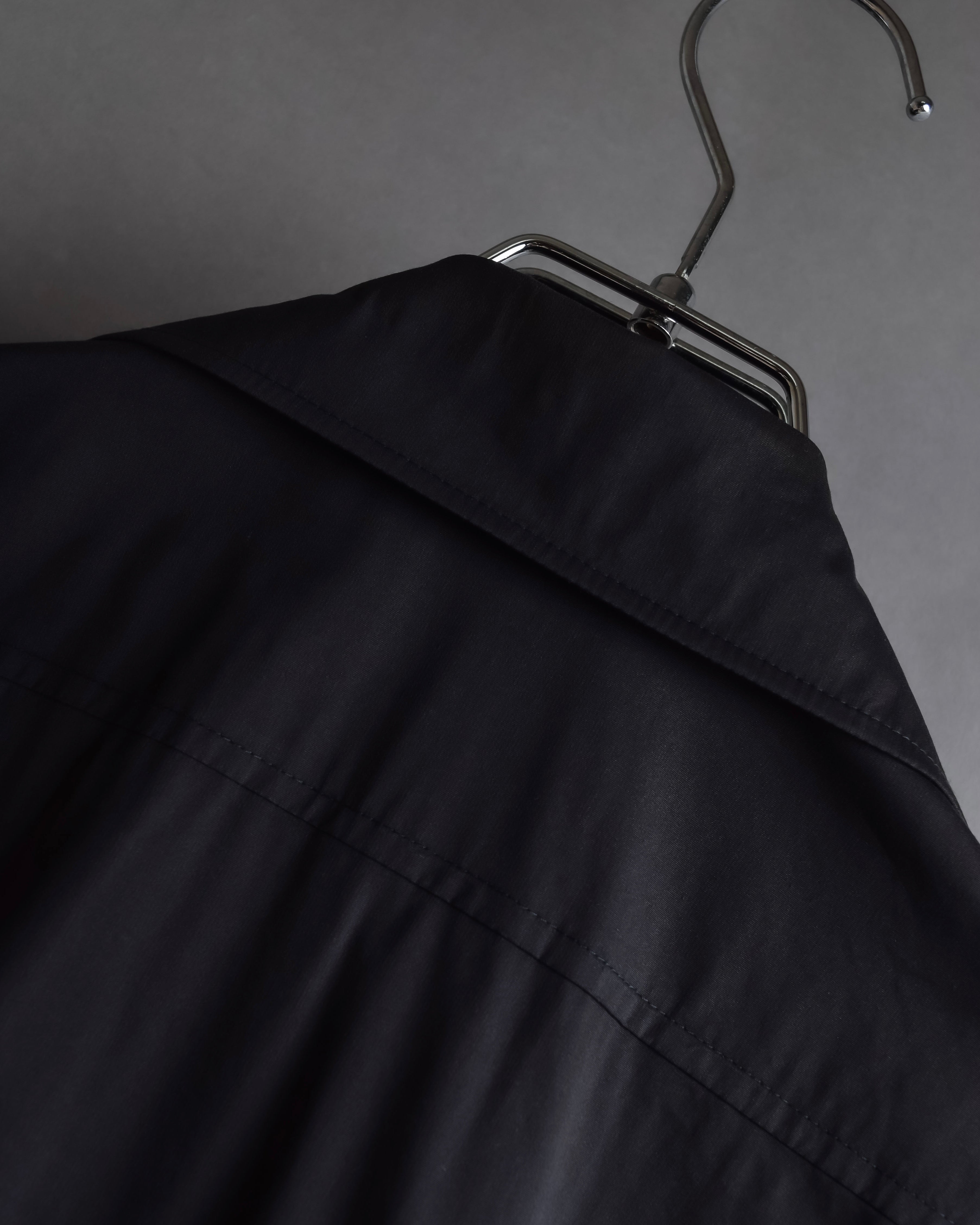 "Yves Saint Laurent Rive Gauche"
Twisted front sleeveless shirt