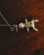 "Saint Laurent" 10's-20's Sculptural doll pendant necklace