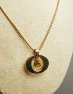 "Christian Dior" 80's-90's Gold logo pendant necklace