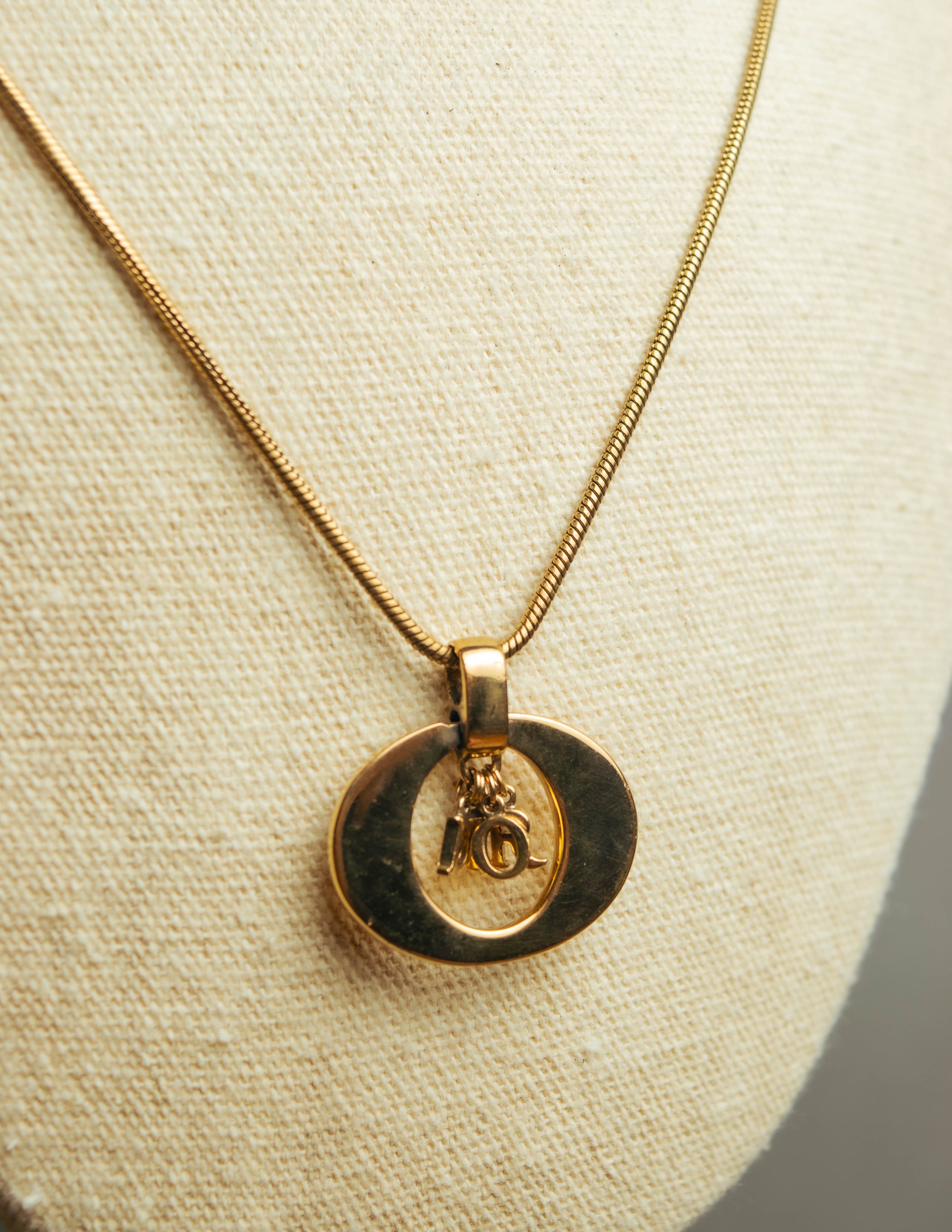 "Christian Dior" 80's-90's Gold logo pendant necklace