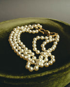 "Salvatore Ferragamo" 80's-90's Gancini three-strand pearl-style necklace