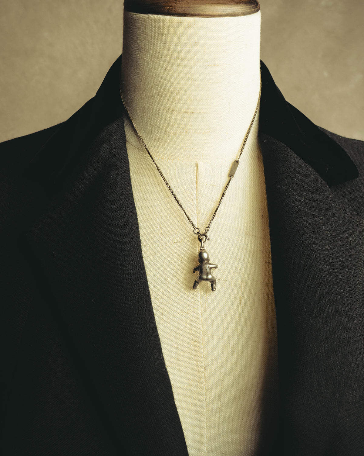 "Saint Laurent" 10's-20's Sculptural doll pendant necklace