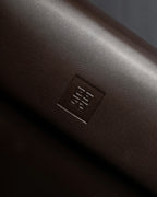 "GIVENCHY MAROQUINERIE" Trapezoidal brown leather one-handle bag