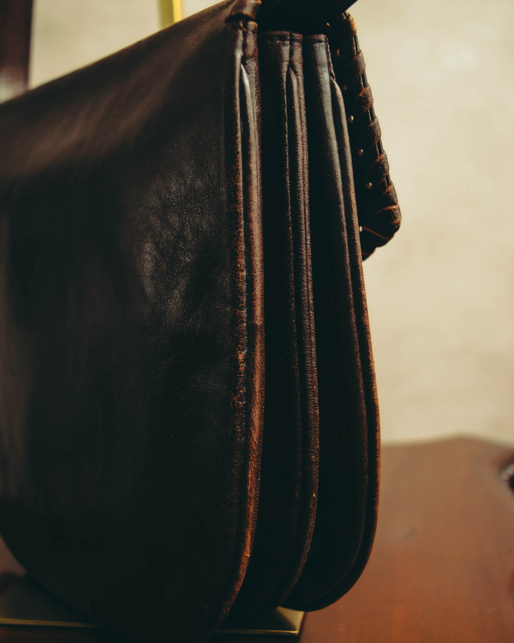 “Yves Saint Laurent” 70’s-80’s Perforated logo leather tassel shoulder bag