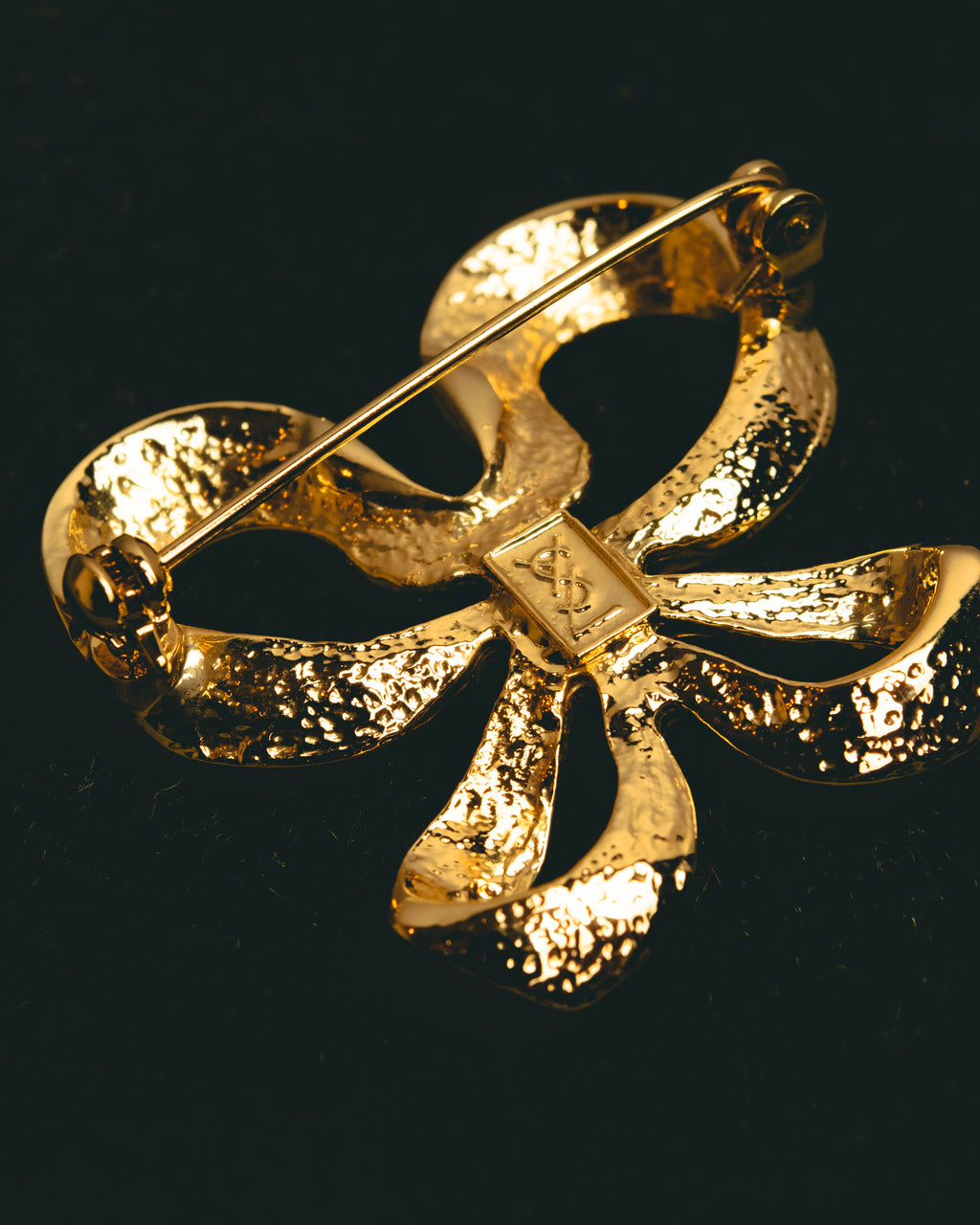 "Yves Saint Laurent" Sculptural gold bow brooch