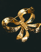 "Yves Saint Laurent" Sculptural gold bow brooch