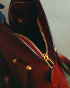 "Cartier" 80's-90's Bordeaux leather handbag