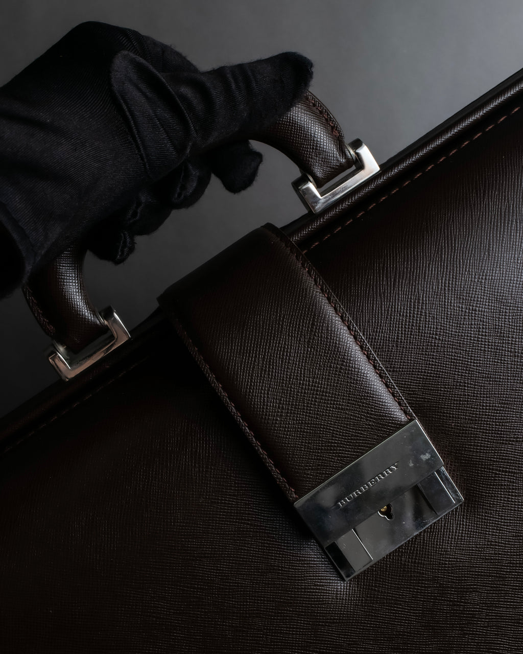 "BURBERRY" Metal belt design embossed PVC briefcase