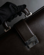 "BURBERRY" Metal belt design embossed PVC briefcase