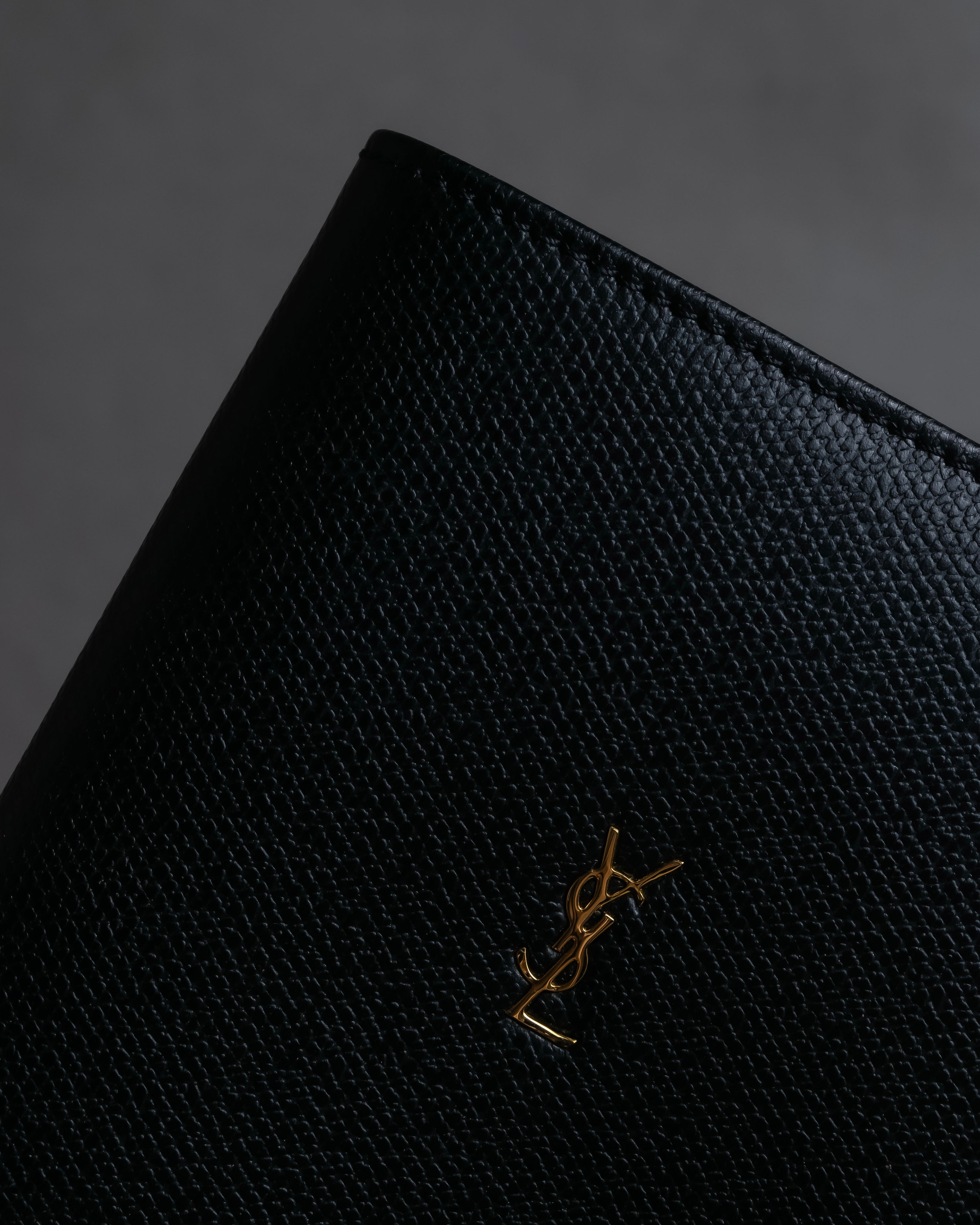 "YVES SAINT LAURENT" Cassandra logo engraved leather bi-fold wallet