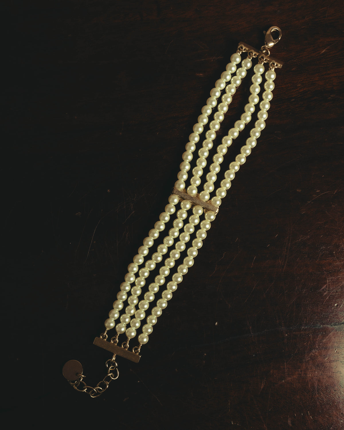 –SPECIAL– “Christian Dior” 2018-2025 Four-strand faux pearl bracelet with sculptural oval accents