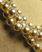 "Salvatore Ferragamo" 80's-90's Gancini three-strand pearl-style necklace