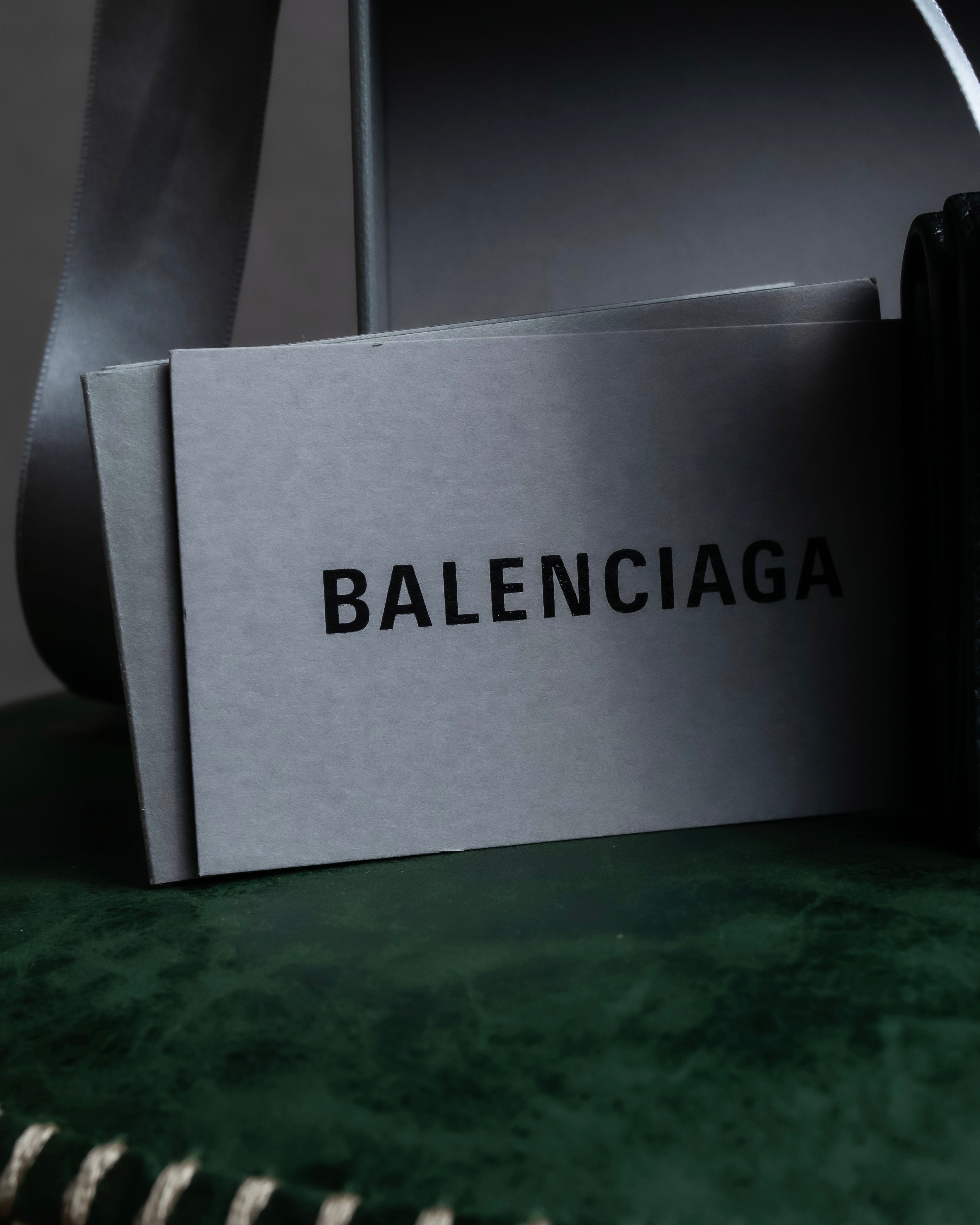 "BALENCIAGA" Logo engraved compact leather tri-fold wallet