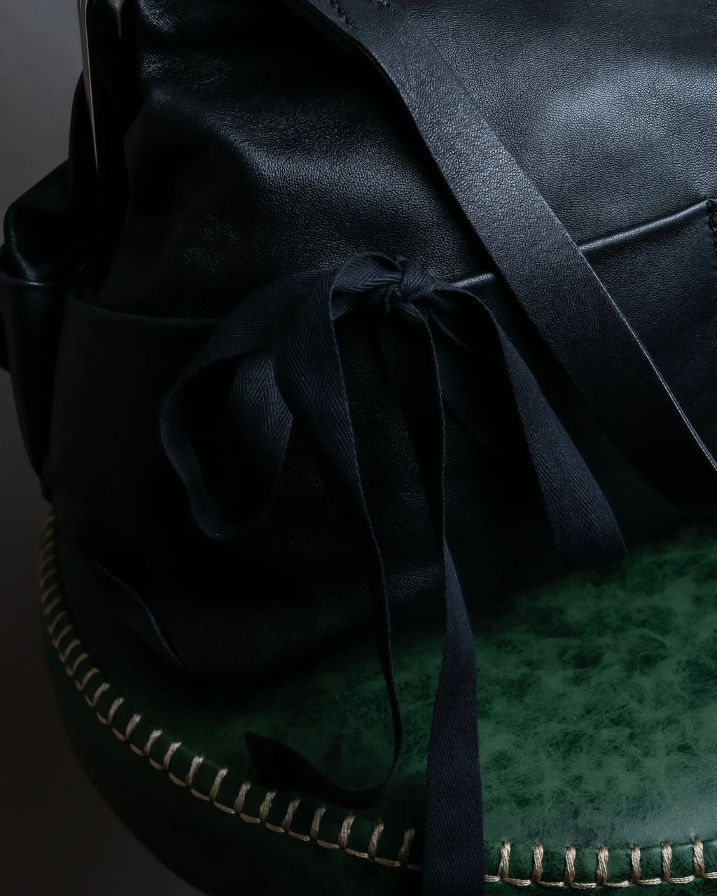 "MARNI" Side ribbon design rounded body leather bag