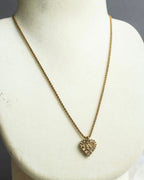 "Christian Dior" Rhinestone studded CD logo design in gold necklace