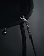 "Y’s" 22AW sculptural kiss-lock leather bag