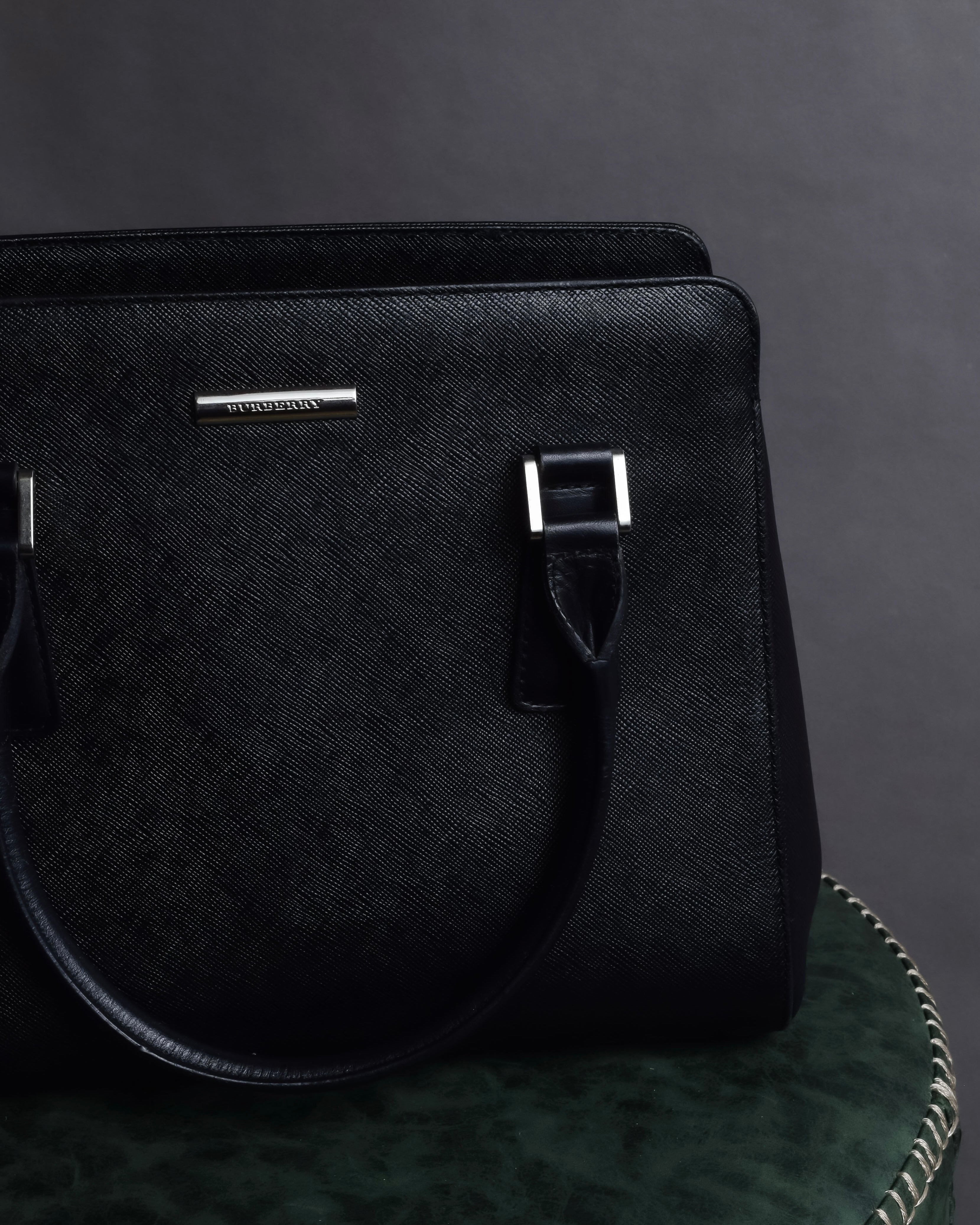 "BURBERRY" Trapezoidal embossed leather one-handle bag