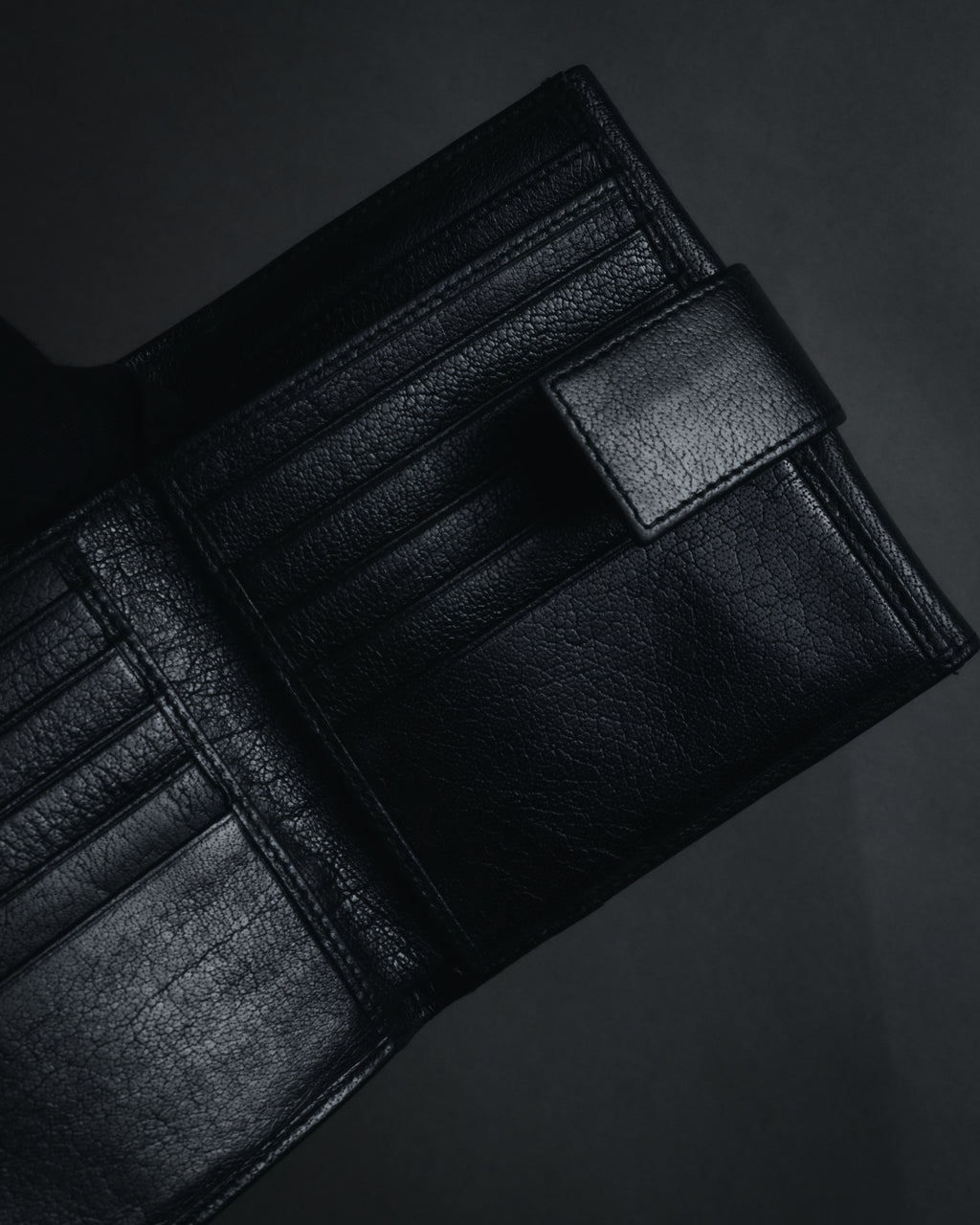 "YVES SAINT LAURENT" Stud-embellished monogram bi-fold wallet