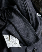 "tricot COMME des GARCONS" 
Double-breasted reversible fur tailored coat