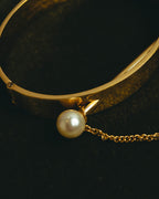 "Chloé" 2010's Gold tone pearl hinged cuff bracelet