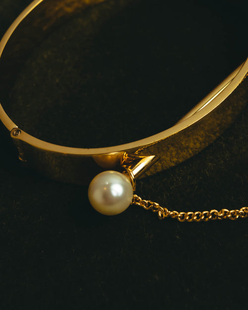 "Chloé" 2010's Gold tone pearl hinged cuff bracelet
