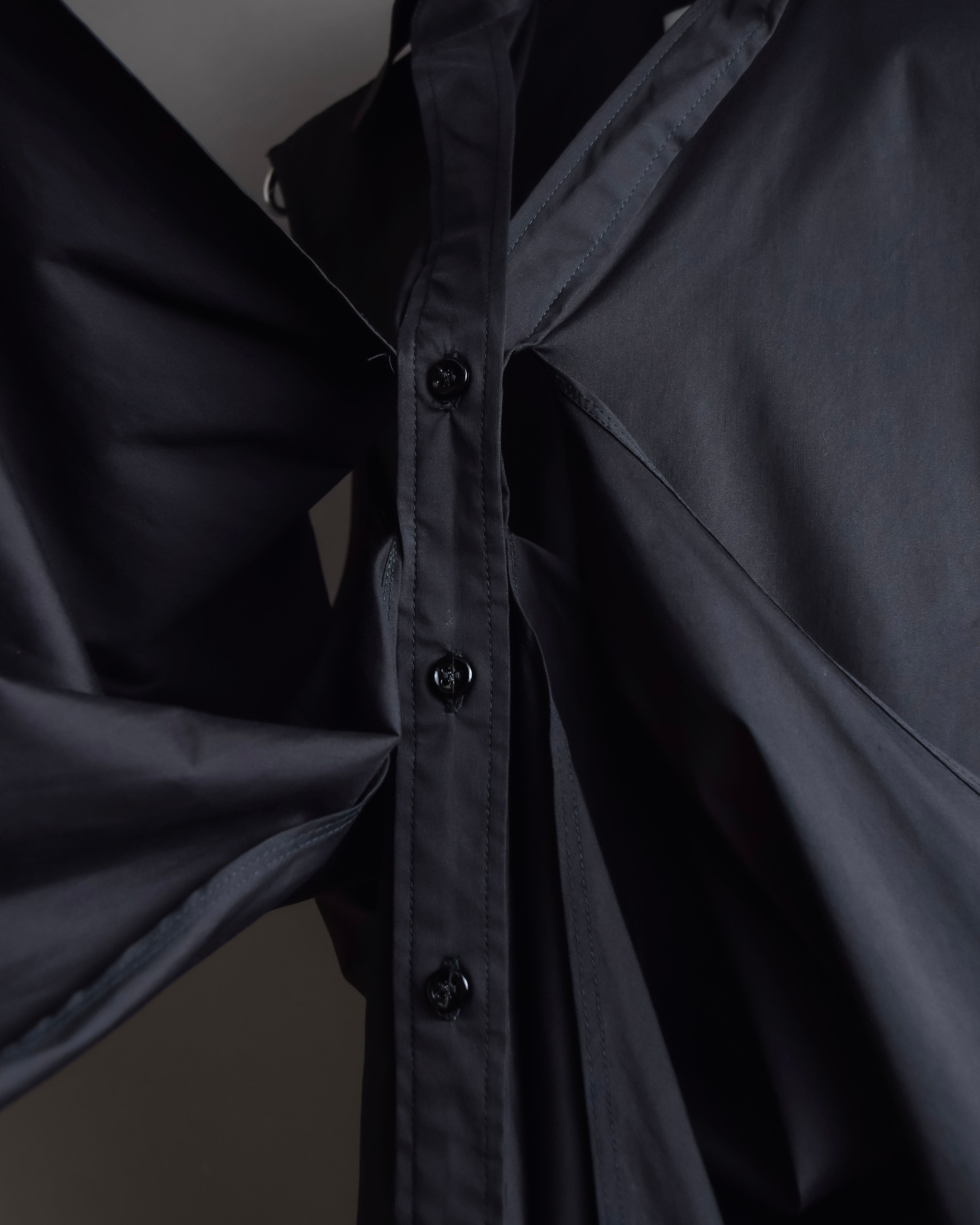 "Yves Saint Laurent Rive Gauche"
Twisted front sleeveless shirt