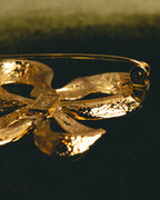 "Yves Saint Laurent" Sculptural gold bow brooch