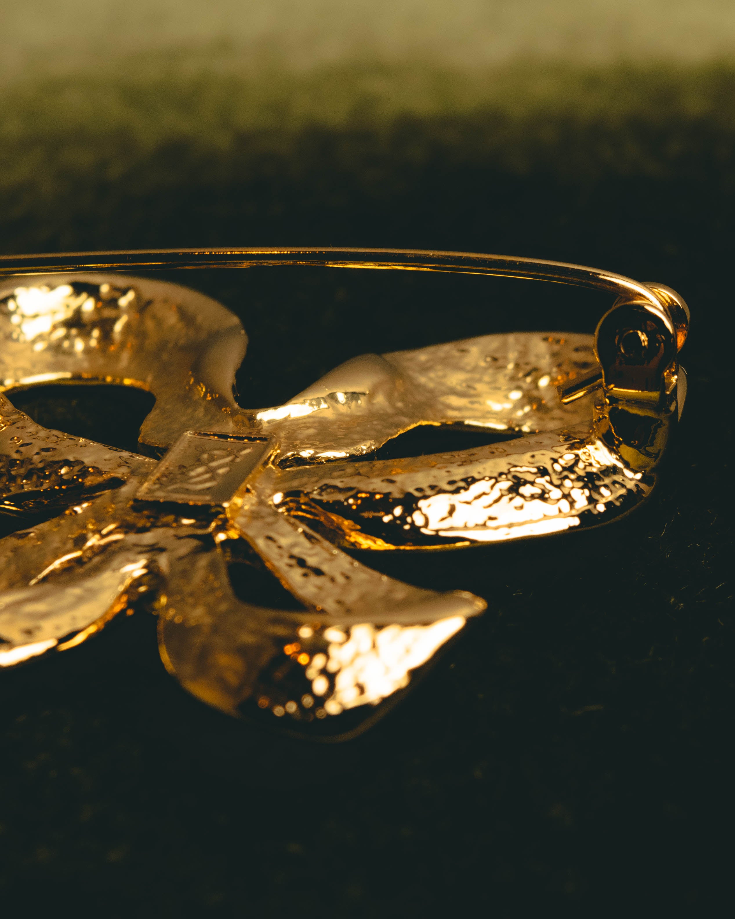 "Yves Saint Laurent" Sculptural gold bow brooch