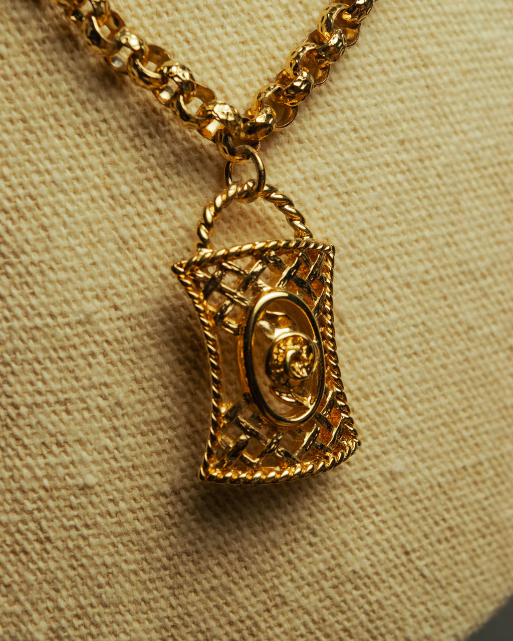 “NINA RICCI” Late 80’s-90’s gold tone openwork pendant necklace