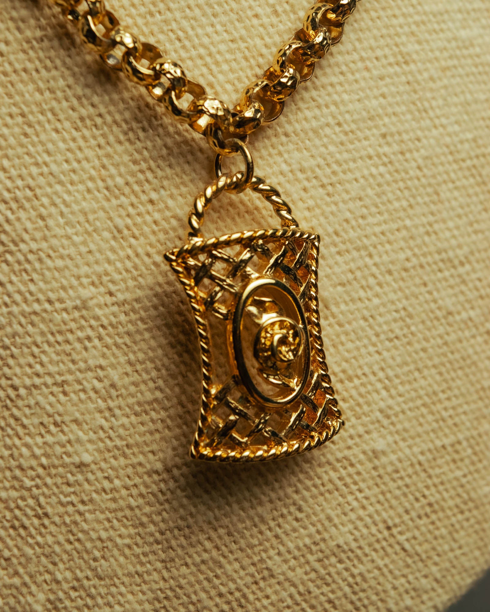 “NINA RICCI” Late 80’s-90’s gold tone openwork pendant necklace