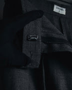 "CHANEL" high-waisted pleated trousers with signature gold button