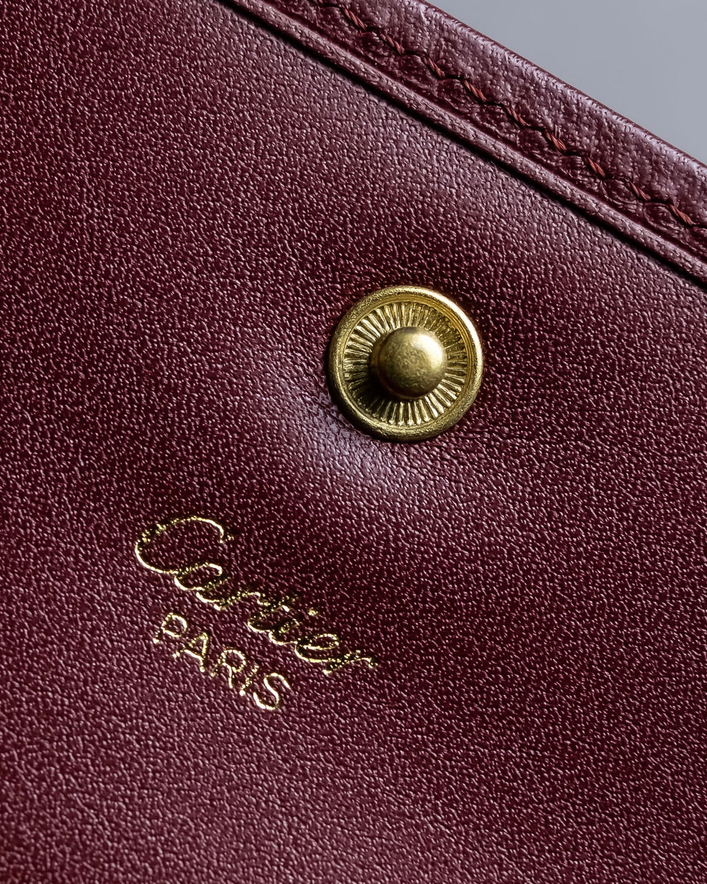"Cartier" Les Must de Cartier bordeaux color leather wallet