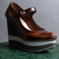 "PRADA" Brown leather stepped sole wedge heel pumps