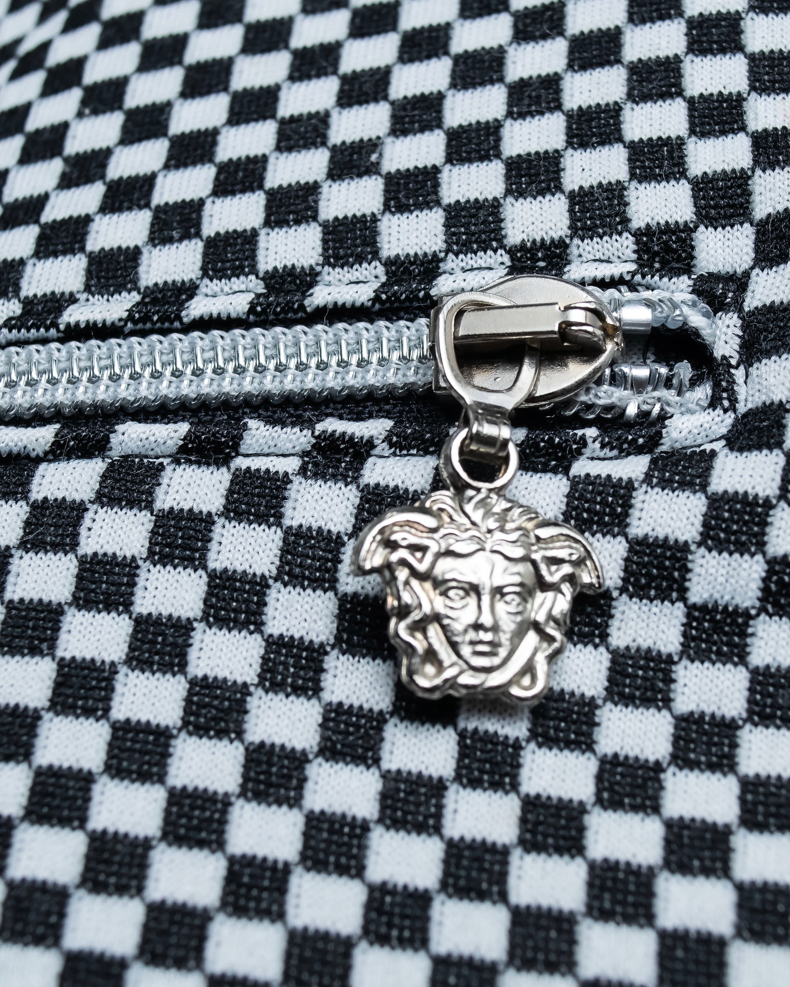 “VERSACE” checkered pattern zip pocket pull over