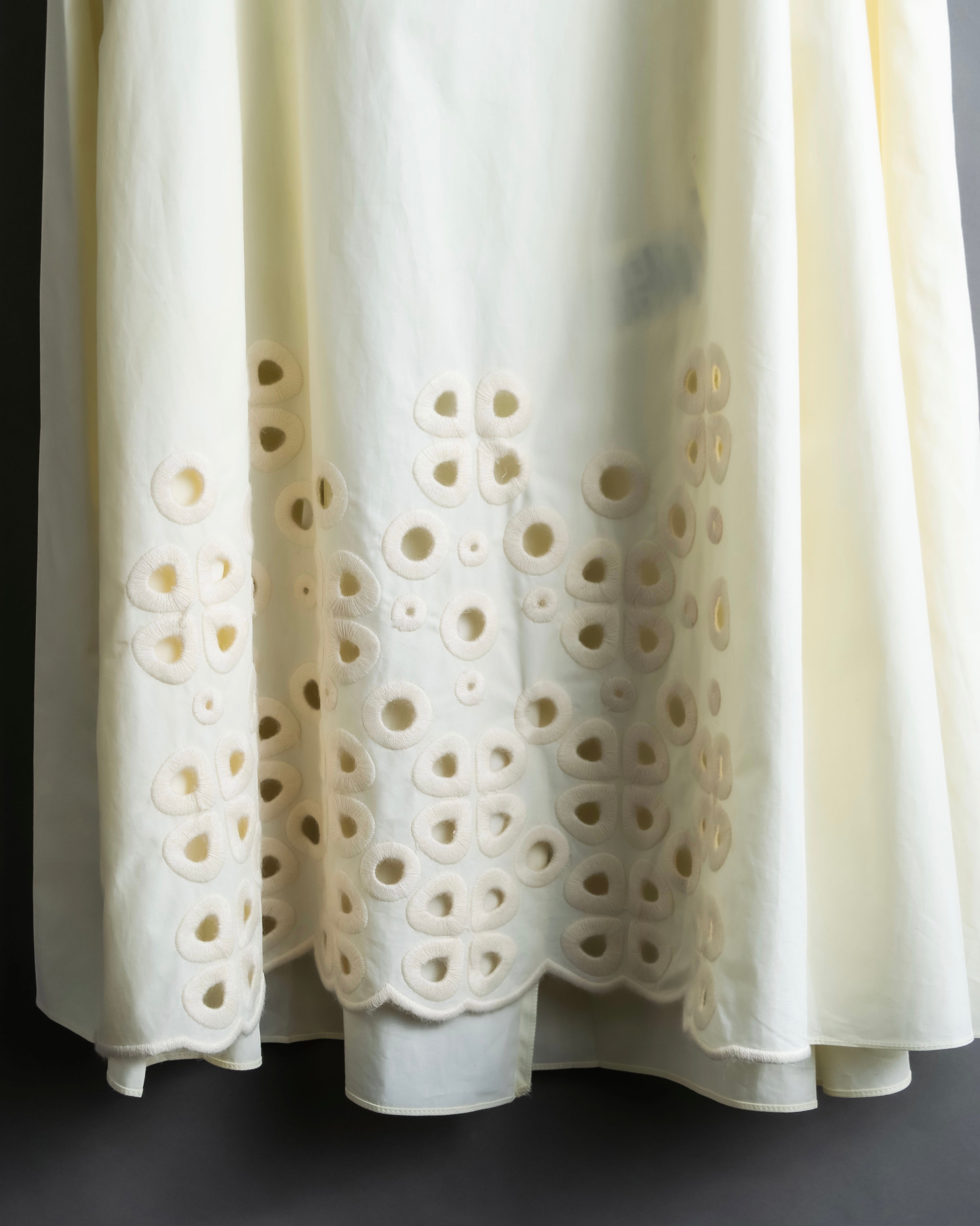 "FENDI" hole pattern and tack designed skirt