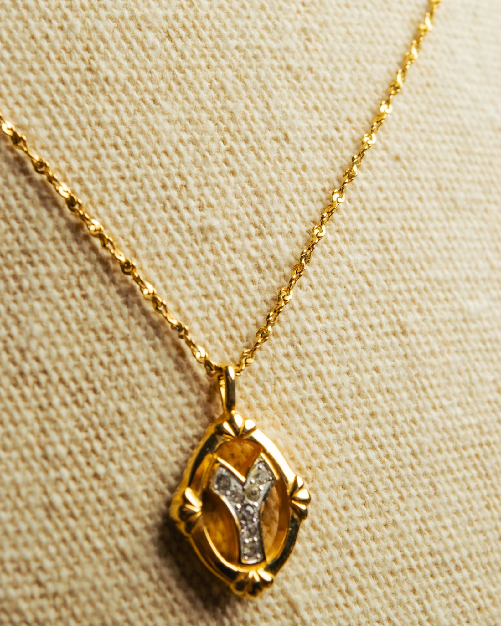 "Yves Saint Laurent" 80's-90's Gold tone rhinestone pendant necklace