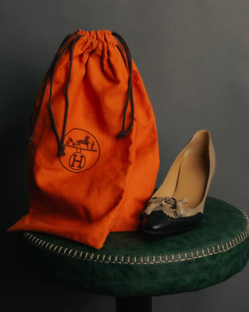 "HERMÈS" 80's-90's Classic bi-color leather tassel brogue pumps