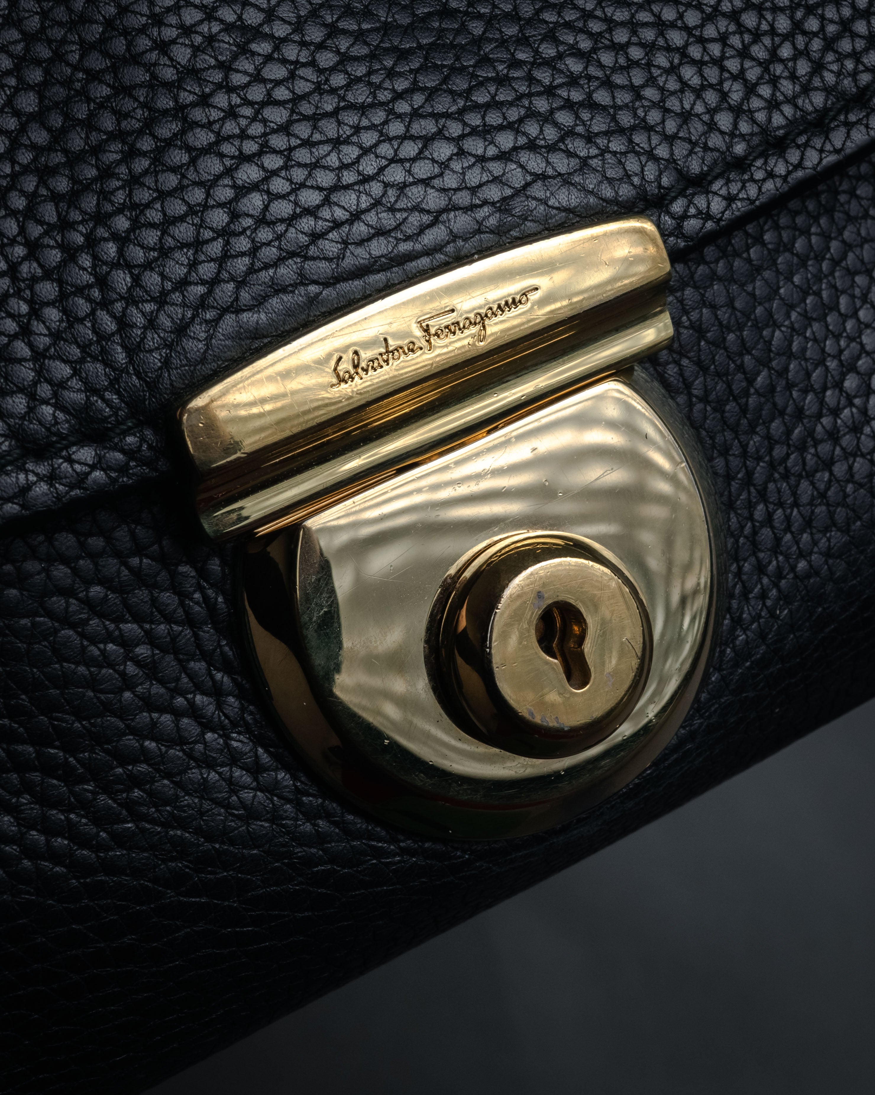 “Salvatore Ferragamo” 2000’s Pebbled leather turn lock bag