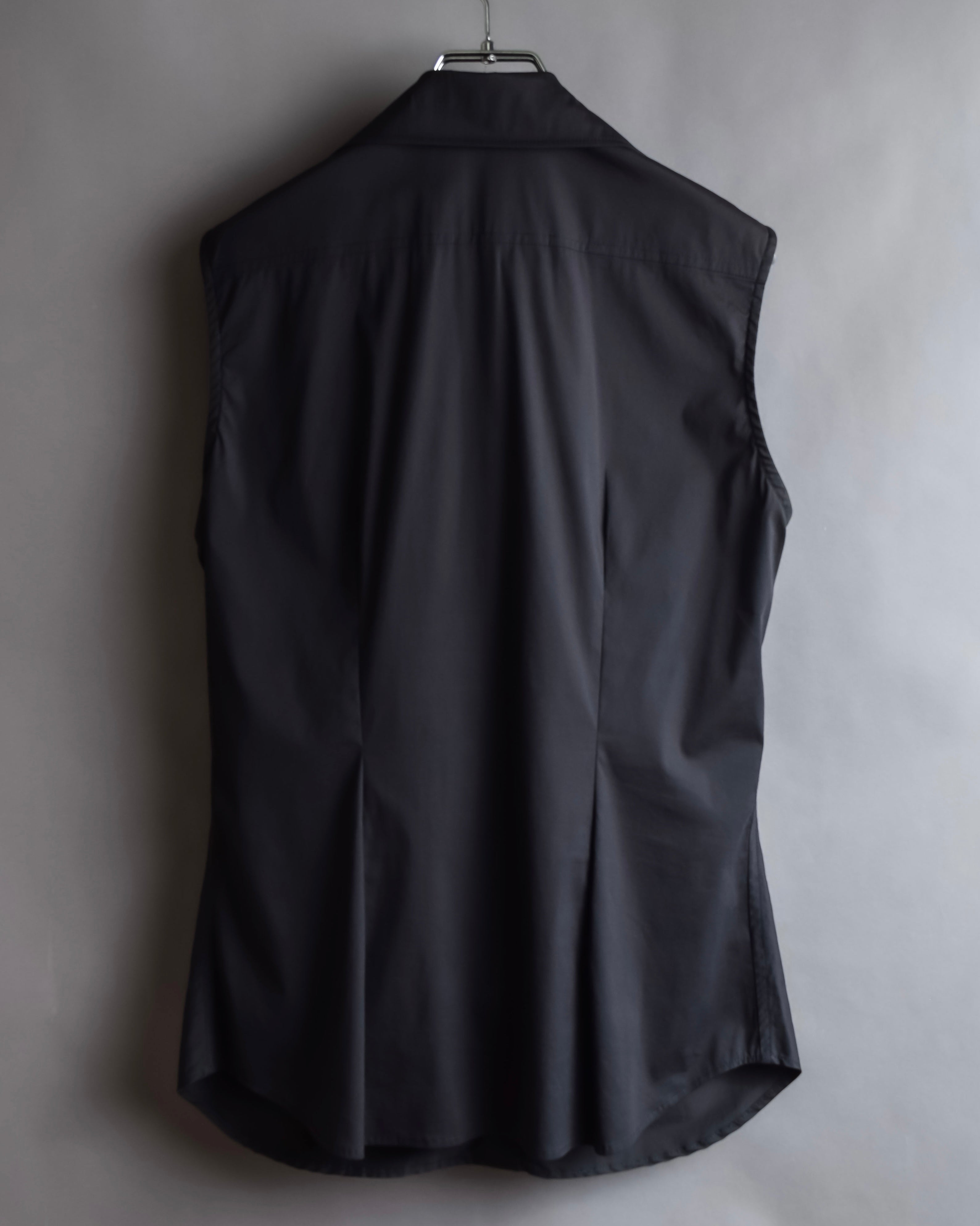 "Yves Saint Laurent Rive Gauche"
Twisted front sleeveless shirt