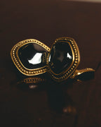 "Yves Saint Laurent" 80's-90's Sculptural black cabochon clip-on earrings