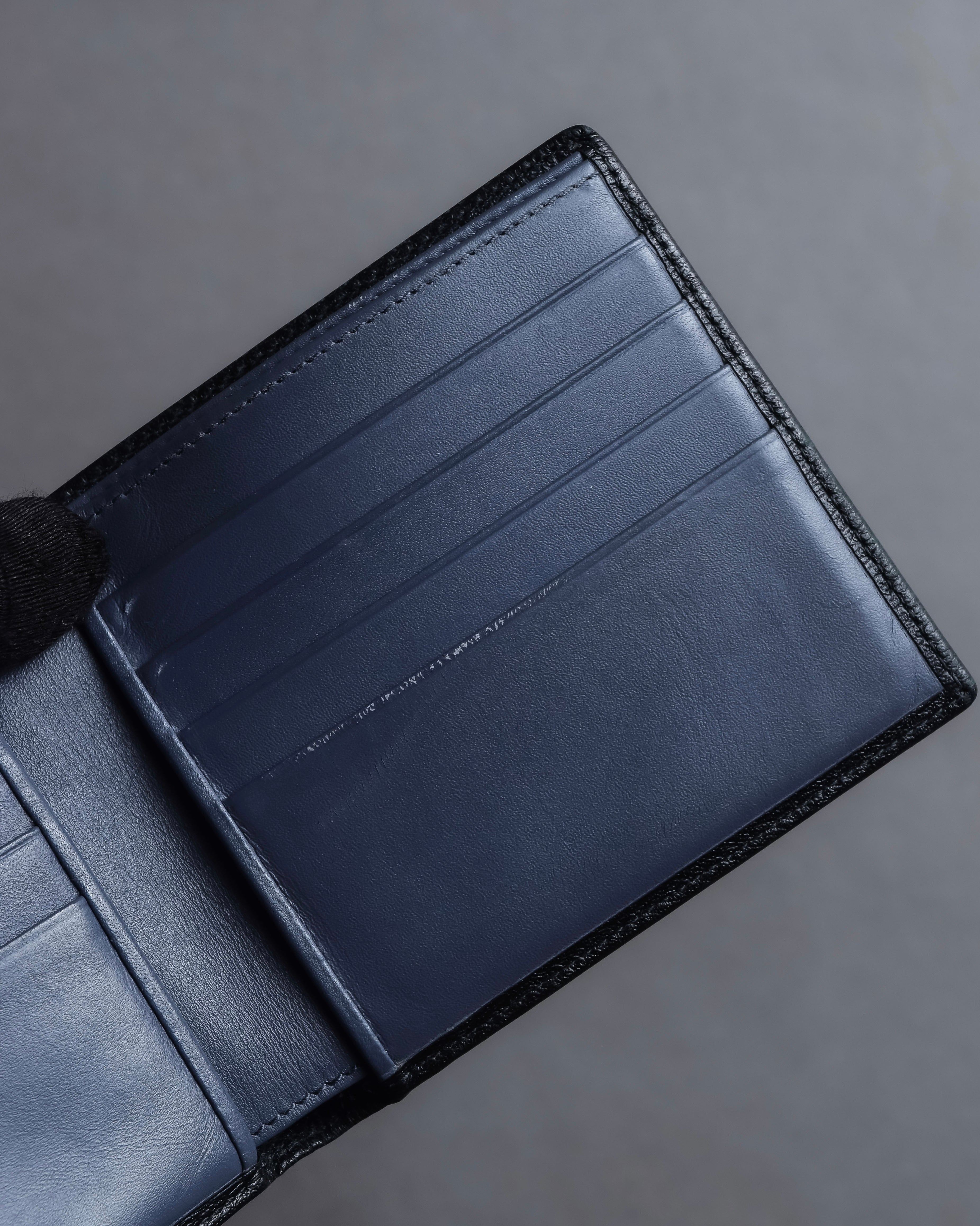 "LOEWE" Logo engraved bi-fold leather wallet